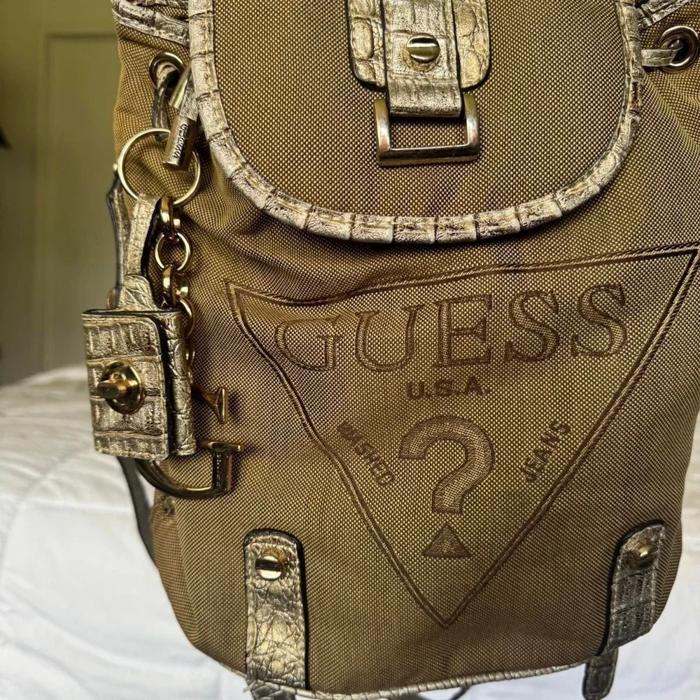 Y2K vintage GUESS drawstring fashion backpack featuring photo book keychain‎